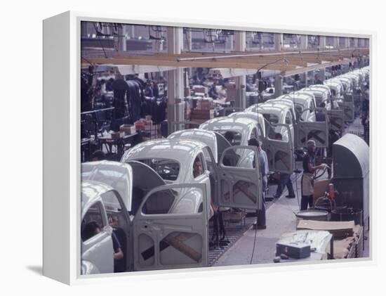 White Volkswagens Coming Down Assembly Line in Brazilian Factory-Paul Schutzer-Framed Premier Image Canvas