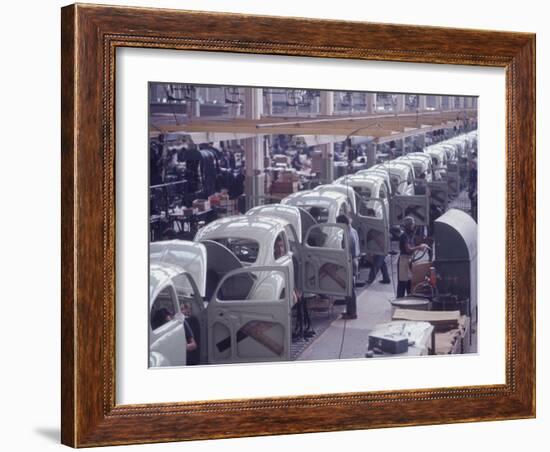 White Volkswagens Coming Down Assembly Line in Brazilian Factory-Paul Schutzer-Framed Photographic Print