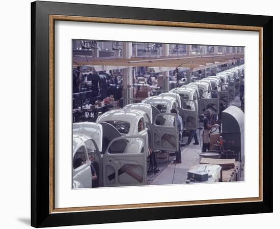 White Volkswagens Coming Down Assembly Line in Brazilian Factory-Paul Schutzer-Framed Photographic Print