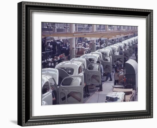 White Volkswagens Coming Down Assembly Line in Brazilian Factory-Paul Schutzer-Framed Photographic Print