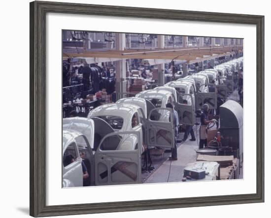 White Volkswagens Coming Down Assembly Line in Brazilian Factory-Paul Schutzer-Framed Photographic Print