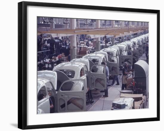 White Volkswagens Coming Down Assembly Line in Brazilian Factory-Paul Schutzer-Framed Photographic Print