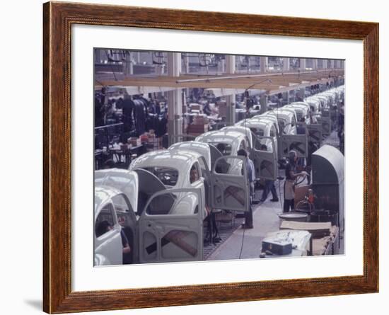 White Volkswagens Coming Down Assembly Line in Brazilian Factory-Paul Schutzer-Framed Photographic Print