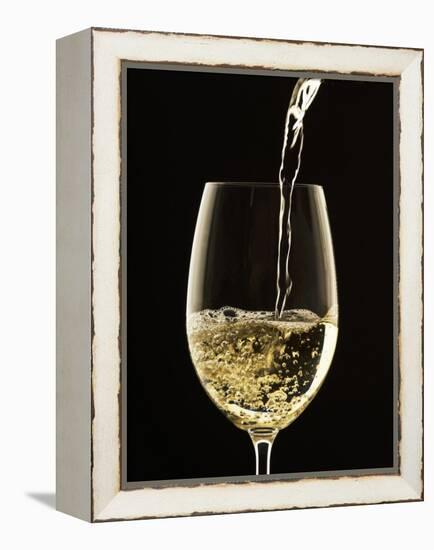 White Wine Pouring from Bottle into Glass-John Hay-Framed Premier Image Canvas