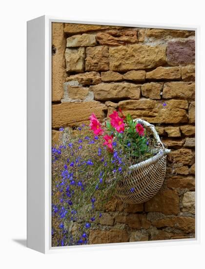 Wicker Basket of Flowers on Limestone Building, Burgundy, France-Lisa S. Engelbrecht-Framed Premier Image Canvas