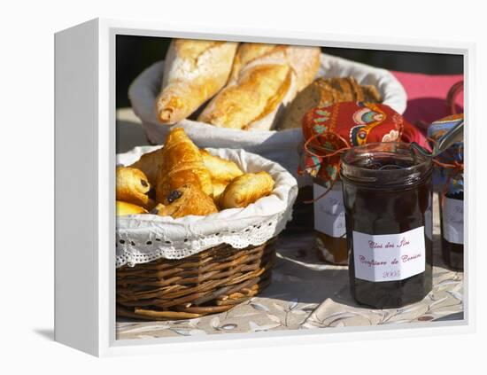 Wicker Basket with Croissants and Breads, Clos Des Iles, Le Brusc, Var, Cote d'Azur, France-Per Karlsson-Framed Premier Image Canvas