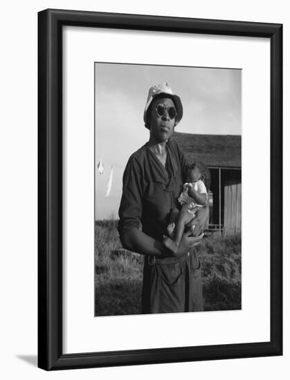 Wife and Child of Tractor Driver-Dorothea Lange-Framed Art Print