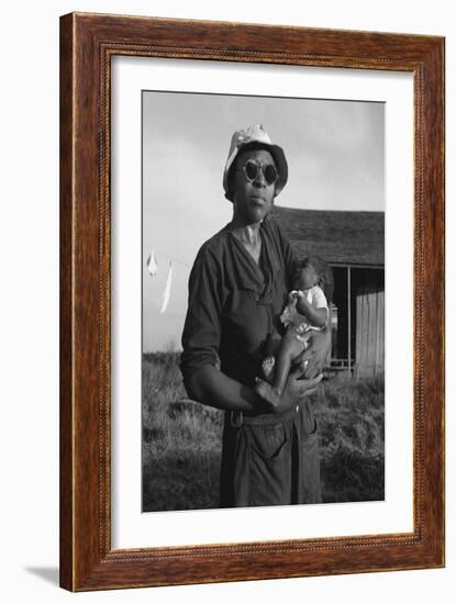 Wife and Child of Tractor Driver-Dorothea Lange-Framed Art Print