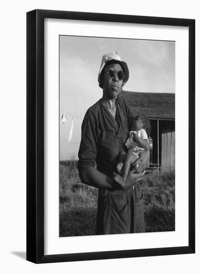 Wife and Child of Tractor Driver-Dorothea Lange-Framed Art Print