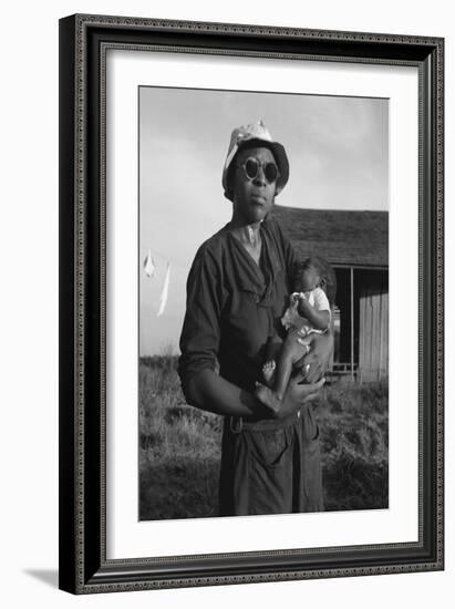 Wife and Child of Tractor Driver-Dorothea Lange-Framed Art Print