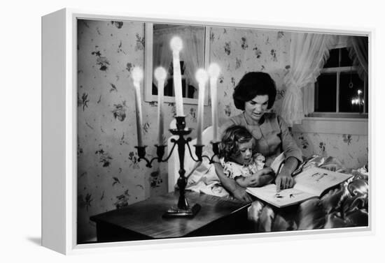 Wife of Senator Jackie Kennedy Reading Book to Her Daughter Caroline In Family's summer home-Alfred Eisenstaedt-Framed Premier Image Canvas