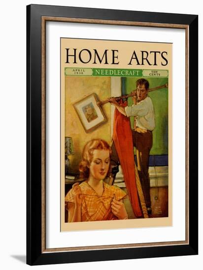 Wife Sews While a Man Hangs a Picture-null-Framed Art Print