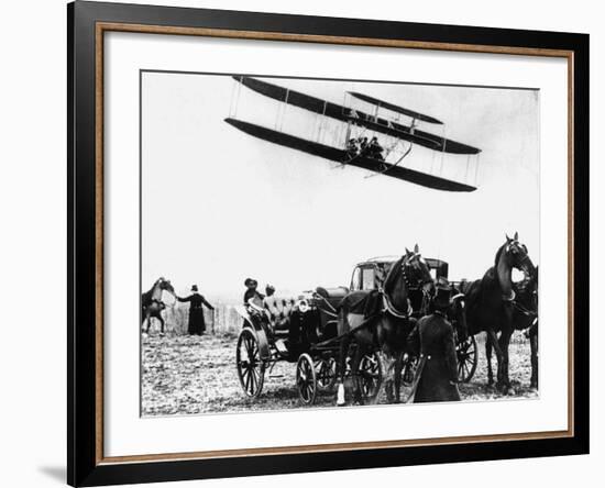 Wilbur Wright with His Plane in Flight at Pau in France, February 1909-null-Framed Photographic Print