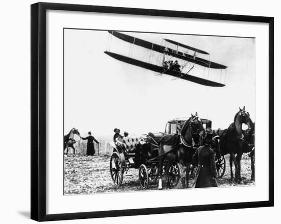 Wilbur Wright with His Plane in Flight at Pau in France, February 1909--Framed Photographic Print