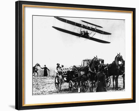 Wilbur Wright with His Plane in Flight at Pau in France, February 1909-null-Framed Photographic Print