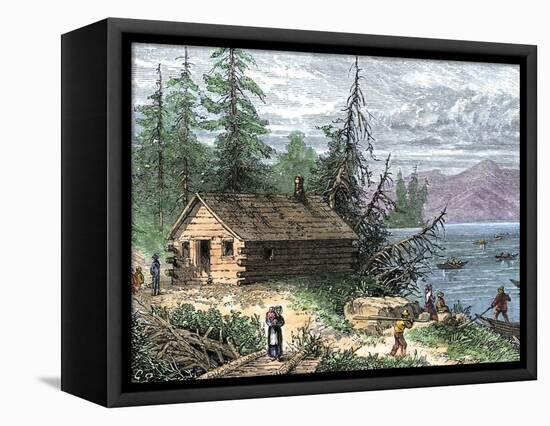 Wilderness Log Cabin of Pioneers Who Travel by River-null-Framed Premier Image Canvas