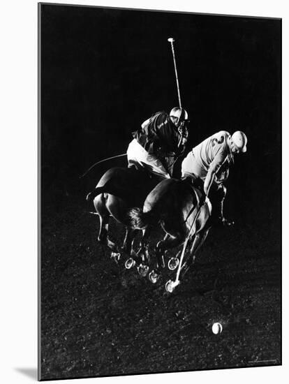 William Nicholls and William Rand of Squadron Polo Team Indoor Polo at National Guard Armory, NYC-Gjon Mili-Mounted Premium Photographic Print