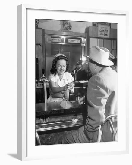 William O. Douglas's Daughter Serving Him a Soda at the Drugstore-null-Framed Photographic Print