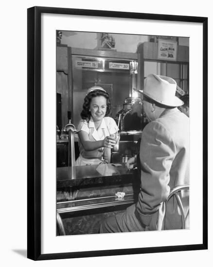 William O. Douglas's Daughter Serving Him a Soda at the Drugstore-null-Framed Photographic Print