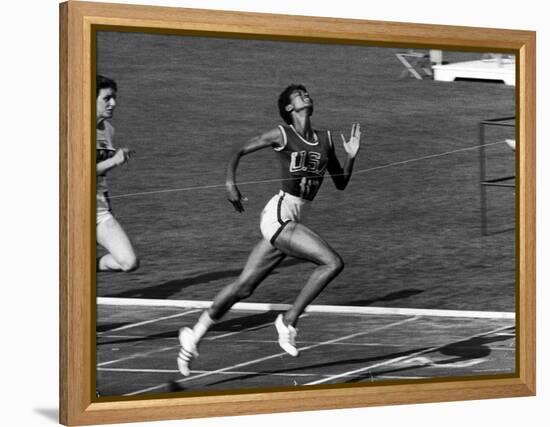 Wilma Rudolph, Across the Finish Line to Win One of Her 3 Gold Medals at the 1960 Summer Olympics-Mark Kauffman-Framed Premier Image Canvas