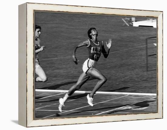 Wilma Rudolph, Across the Finish Line to Win One of Her 3 Gold Medals at the 1960 Summer Olympics-Mark Kauffman-Framed Premier Image Canvas