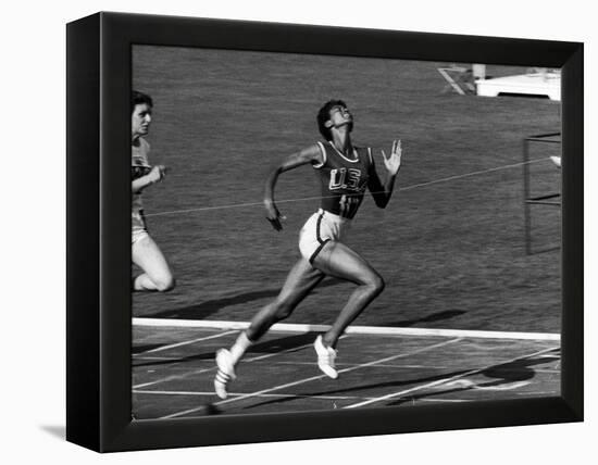 Wilma Rudolph, Across the Finish Line to Win One of Her 3 Gold Medals at the 1960 Summer Olympics-Mark Kauffman-Framed Premier Image Canvas