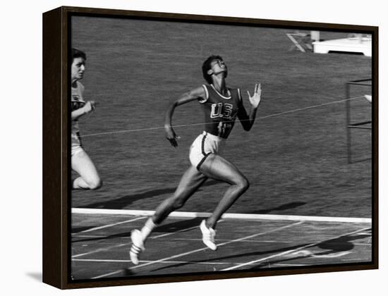 Wilma Rudolph, Across the Finish Line to Win One of Her 3 Gold Medals at the 1960 Summer Olympics-Mark Kauffman-Framed Premier Image Canvas