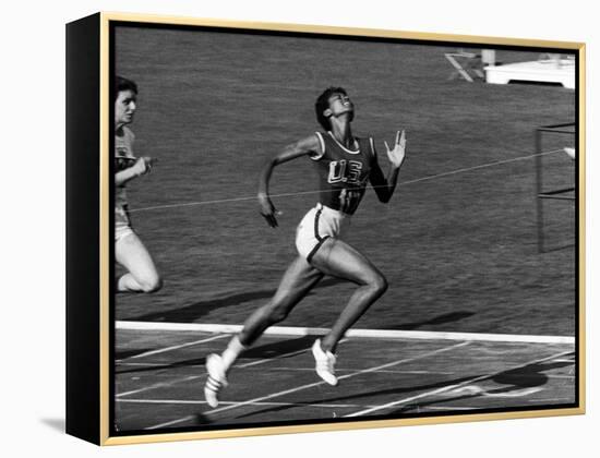 Wilma Rudolph, Across the Finish Line to Win One of Her 3 Gold Medals at the 1960 Summer Olympics-Mark Kauffman-Framed Premier Image Canvas