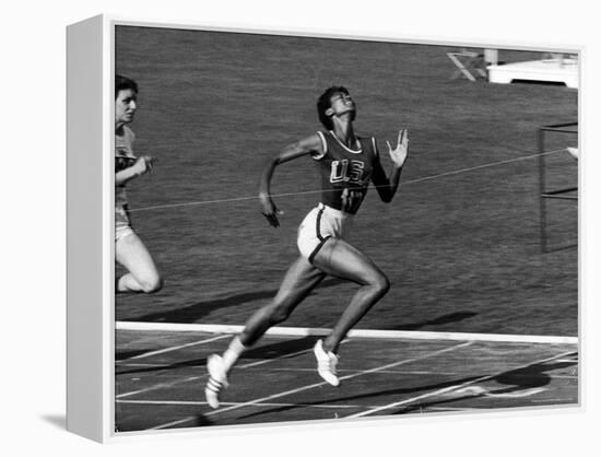 Wilma Rudolph, Across the Finish Line to Win One of Her 3 Gold Medals at the 1960 Summer Olympics-Mark Kauffman-Framed Premier Image Canvas