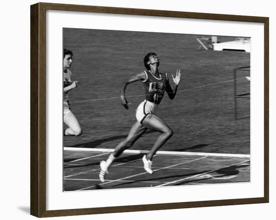 Wilma Rudolph, Across the Finish Line to Win One of Her 3 Gold Medals at the 1960 Summer Olympics-Mark Kauffman-Framed Premium Photographic Print