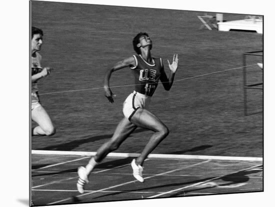 Wilma Rudolph, Across the Finish Line to Win One of Her 3 Gold Medals at the 1960 Summer Olympics-Mark Kauffman-Mounted Premium Photographic Print