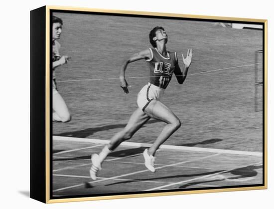 Wilma Rudolph, Across the Finish Line to Win One of Her 3 Gold Medals at the 1960 Summer Olympics-Mark Kauffman-Framed Premier Image Canvas