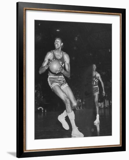 Wilt Chamberlain Playing Basketball During a Game Against Iowa State-Stan Wayman-Framed Premium Photographic Print