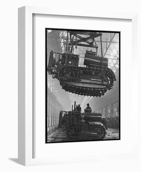 Winching a Tank with an Overhead Crane at a Factory in St. Petersburg-null-Framed Premium Giclee Print