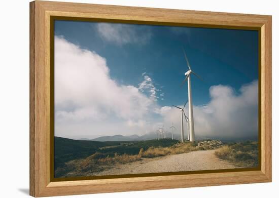 Wind Turbine-Clive Nolan-Framed Premier Image Canvas