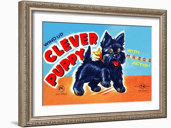 Wind Up Clever Puppy-null-Framed Art Print