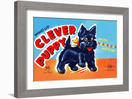 Wind Up Clever Puppy-null-Framed Art Print