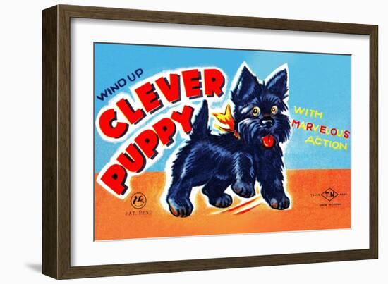 Wind Up Clever Puppy-null-Framed Art Print