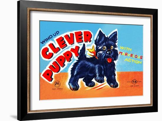 Wind Up Clever Puppy-null-Framed Art Print