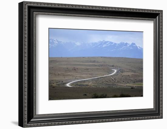 Winding desert road and Andes mountains, El Calafate, Parque Nacional Los Glaciares, UNESCO World H-Stuart Black-Framed Photographic Print