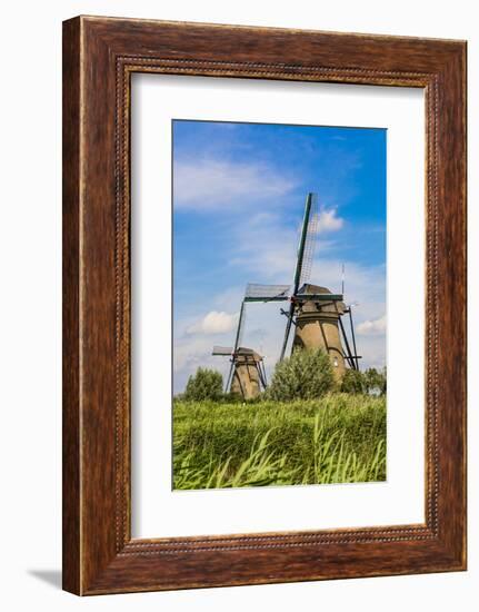 Windmill in Unesco World Heritage Site, Kinderdijk, Holland, Netherlands.-Michael DeFreitas-Framed Photographic Print