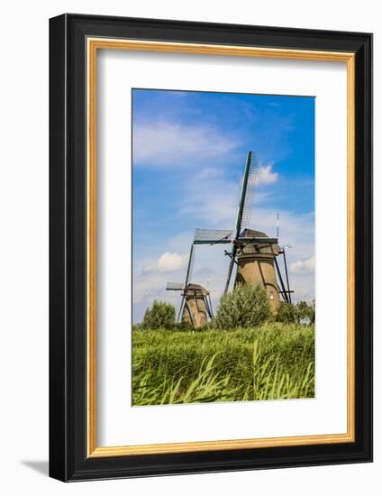 Windmill in Unesco World Heritage Site, Kinderdijk, Holland, Netherlands.-Michael DeFreitas-Framed Photographic Print