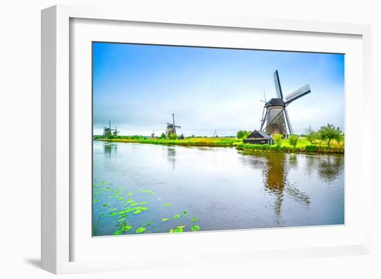 Windmills and Canal in Kinderdijk, Holland or Netherlands. Unesco Site-stevanzz-Framed Photographic Print