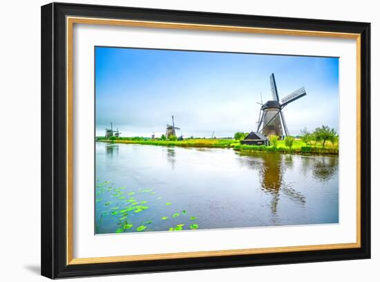 Windmills and Canal in Kinderdijk, Holland or Netherlands. Unesco Site-stevanzz-Framed Photographic Print