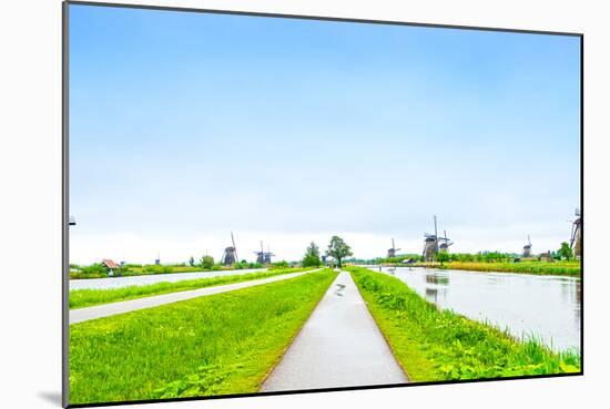 Windmills and Canals in Kinderdijk, Holland or Netherlands. Unesco Site-stevanzz-Mounted Photographic Print