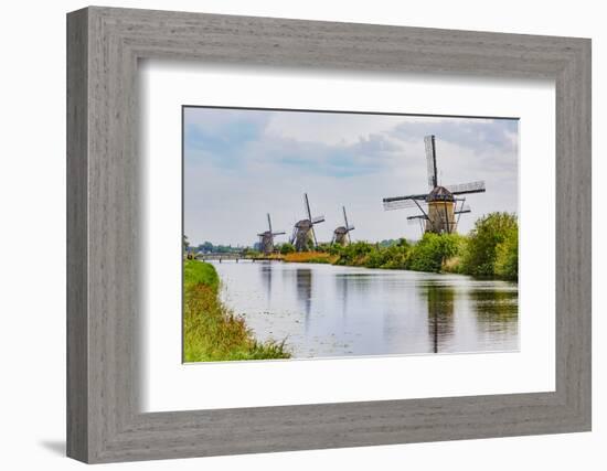 Windmills of Kinderdijk, in the municipality of Molenwaard. UNESCO World Heritage Site since 1997.-Adam Jones-Framed Photographic Print