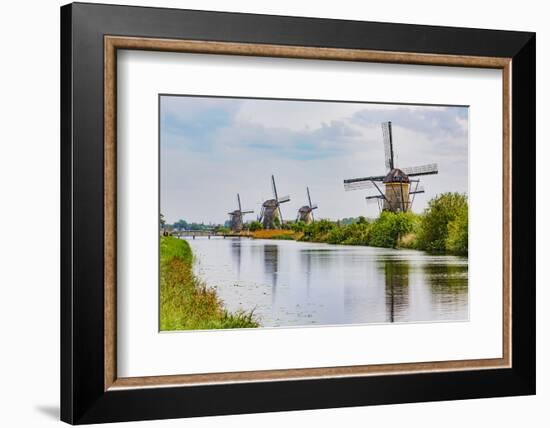 Windmills of Kinderdijk, in the municipality of Molenwaard. UNESCO World Heritage Site since 1997.-Adam Jones-Framed Photographic Print