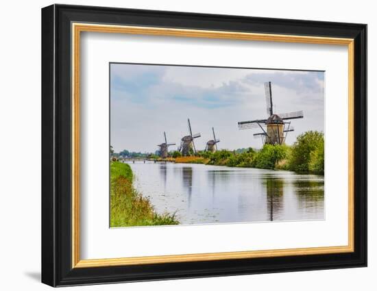 Windmills of Kinderdijk, in the municipality of Molenwaard. UNESCO World Heritage Site since 1997.-Adam Jones-Framed Photographic Print