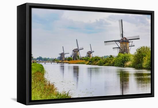 Windmills of Kinderdijk, in the municipality of Molenwaard. UNESCO World Heritage Site since 1997.-Adam Jones-Framed Premier Image Canvas