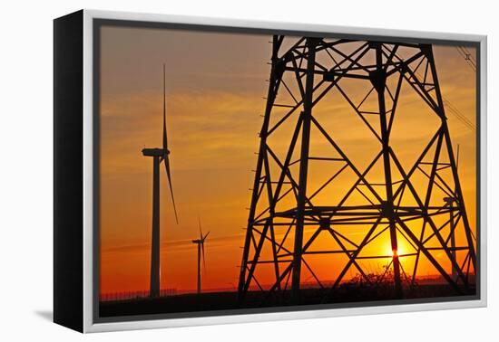 Windmills, pylon and power lines in morning light, Germany, Europe-Hans-Peter Merten-Framed Premier Image Canvas